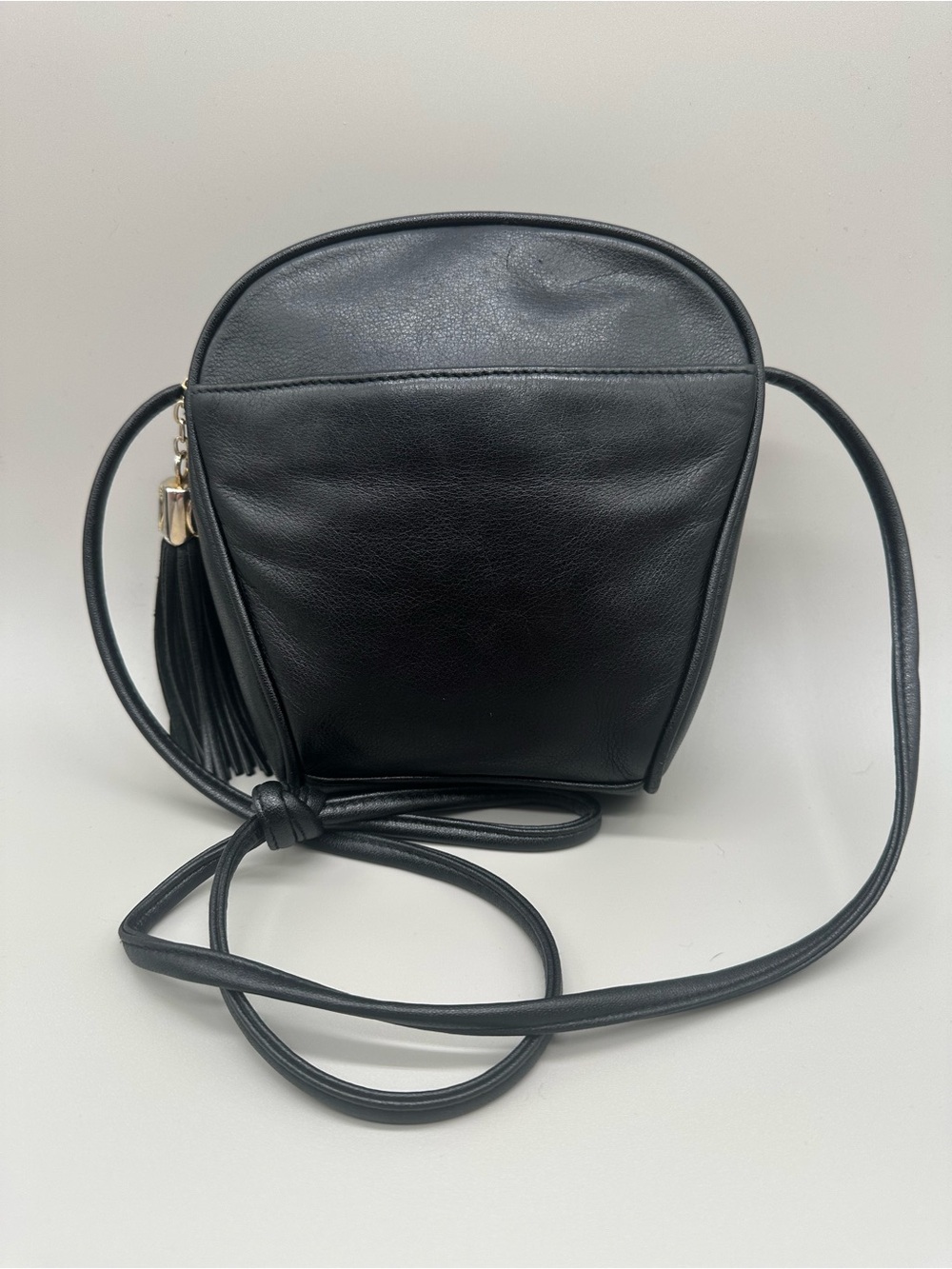 Studio Imports Classic Black Leather Crossbody Bag with Brass & Leather Tassel